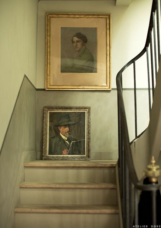 dark and moody interior rooms for fall staircase with portrait