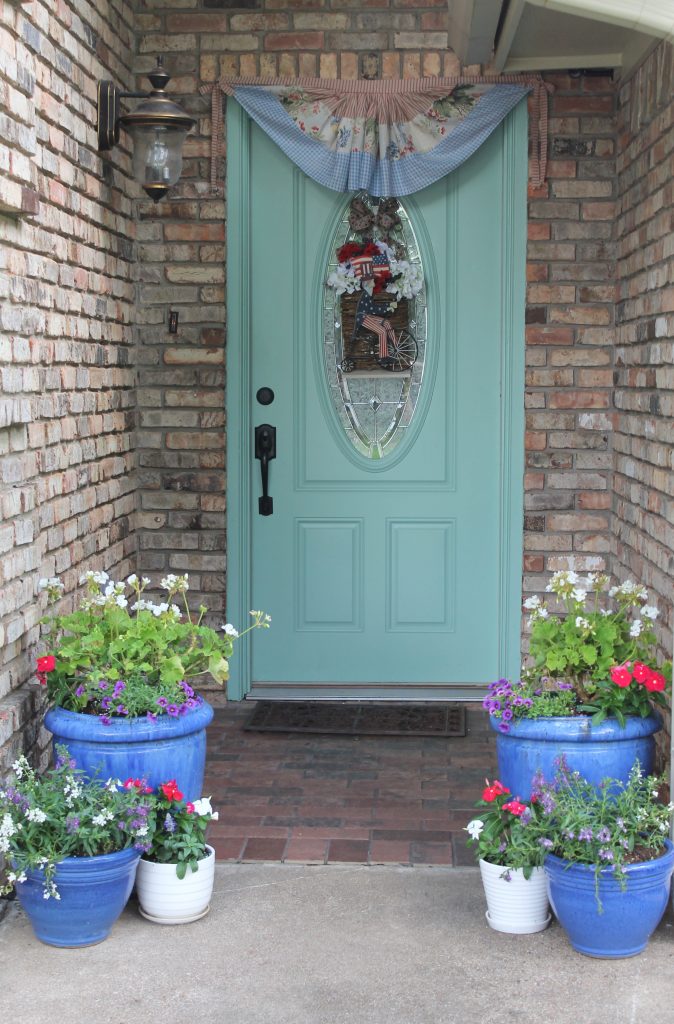 A Patriotic Porch At Storybook Cottage