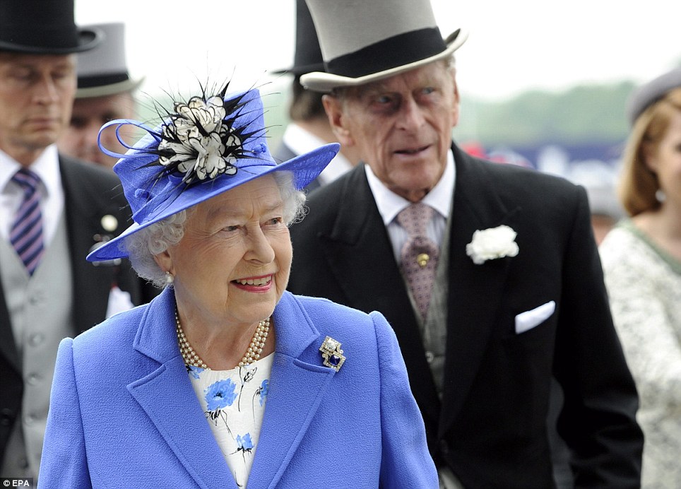 Day at the races: Both Queen Elizabeth II and her husband Prince Philip, Duke of Edinburgh, looked delighted by their warm welcome at Epsom racecourse