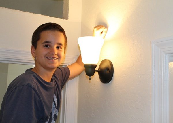 10 year old installs lighting