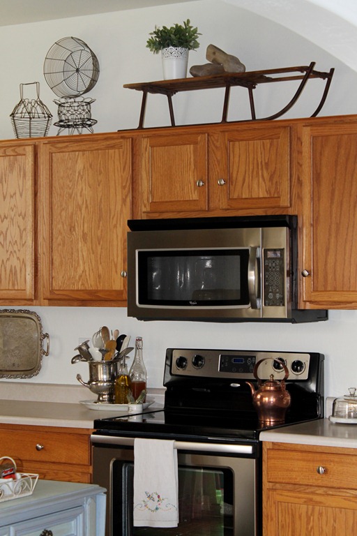 Decorating Above The Kitchen Cabinets