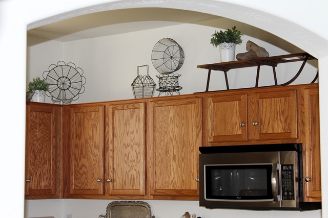 Decorating Above The Kitchen Cabinets