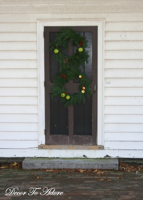 two wreaths on one door