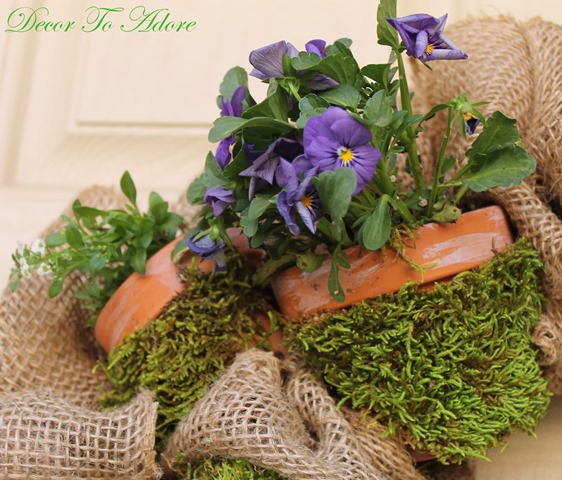 wreath with potted flowers