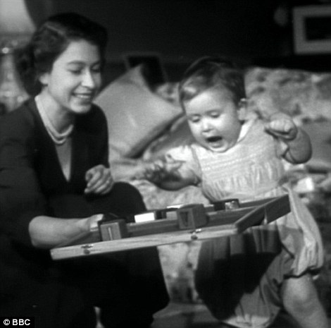 Prince Charles appears excited while the Queen looks relaxed in these intimate shots of the pair