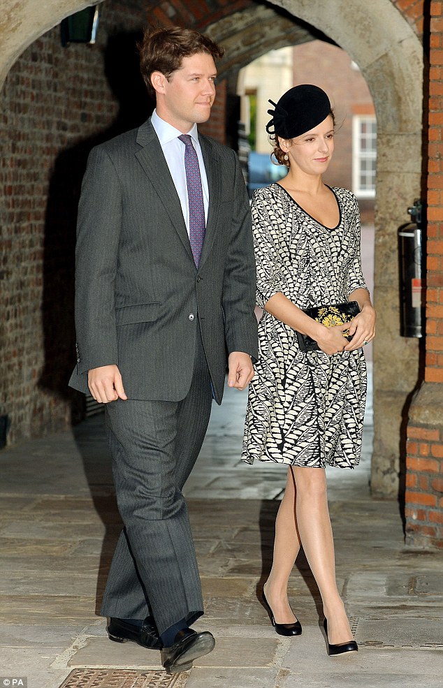 Godmother: Kate's old schoolfriend Emilia Jardine-Paterson and her husband David arriving at the Chapel Royal