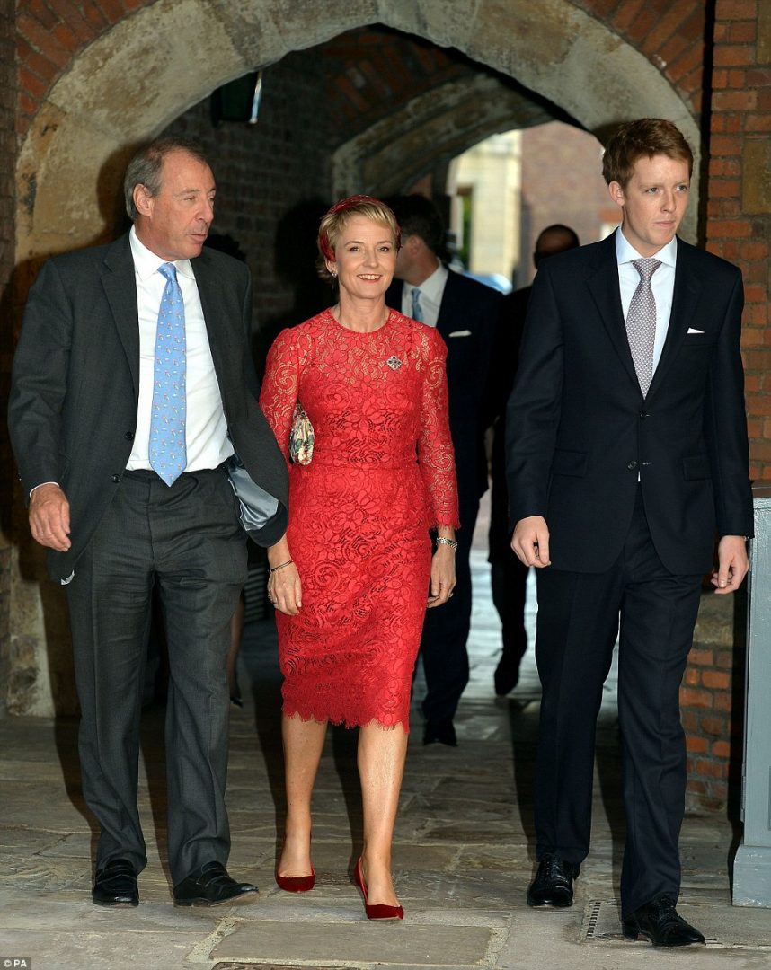 Prince George's godparents Julia Samuel and Hugh Grosvenor are pictured arriving with The Hon. Mrs Samuel's husband, Michael, left