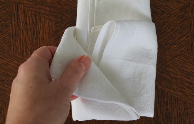 Folding a pocket square napkin