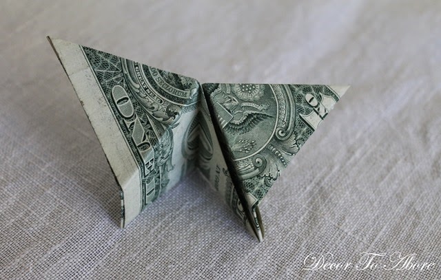 Butterfly dollar bill