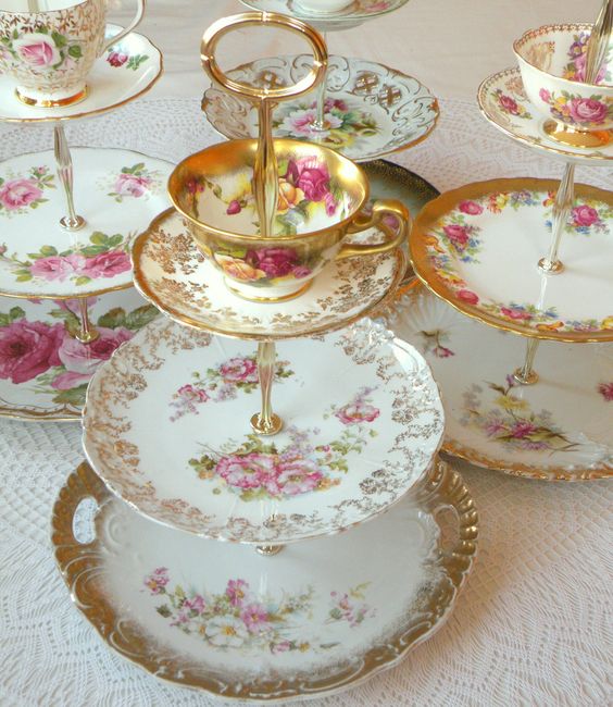 A group of our High Tea for Alice 3-tiered rental tea stands, cake plates and cupcake towers with cup and saucer available for rent in Orange County, Southern California and beyond for weddings, bridal teas, baby showers, princess birthday parties and more