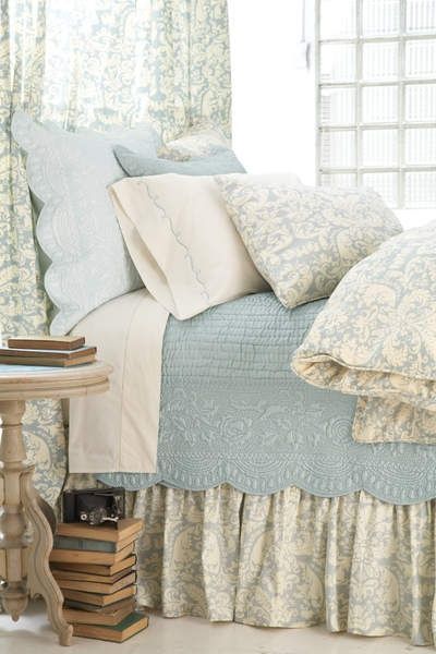 Nice soft blue, cream & white colour scheme for bedroom with lots of layering of quilts & blankets: 
