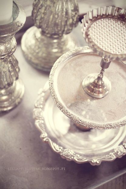 Diy for all those random silver plates, with silver candlesticks.. works for me!!: 