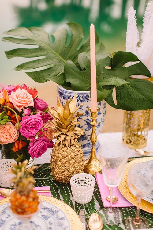 Paint pineapples gold for table decorations | Brides.com: 