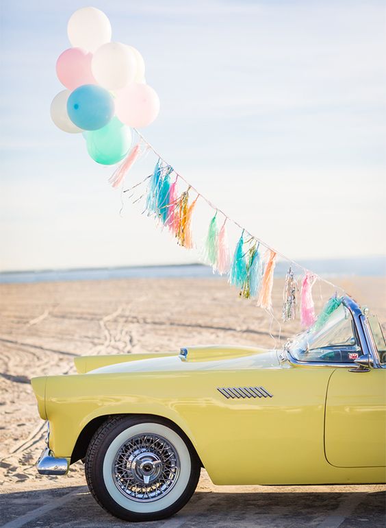 Nicole Alexandra Designs created a colorful set for this retro anniversary shoot: 