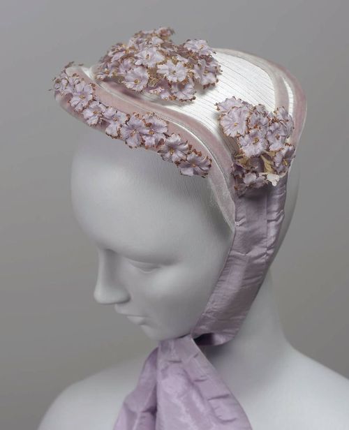 Bonnet Made Of White Straw, Designed To Be Worn On Top Of The Head, Trimmed