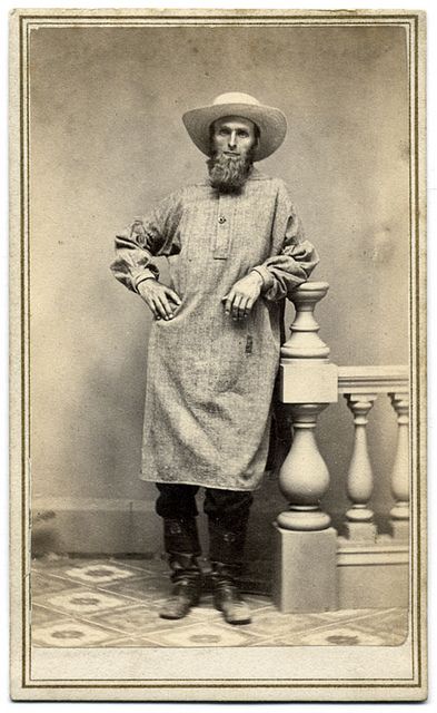 A New England Man Wearing a Smock | straw hat