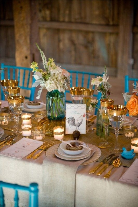 So glam! Love these turquoise chairs and #gold accessories all over the table…: 