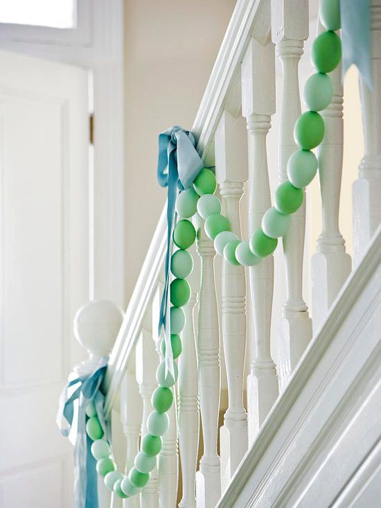 Decorate a staircase, mantel or table with an Easter egg garland. How-To: http://www.bhg.com/holidays/easter/decorating/decorate-with-easter-eggs/#page=7: 