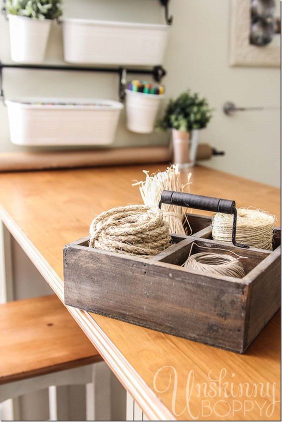 Use an old divided box to store twine in Craft Room.