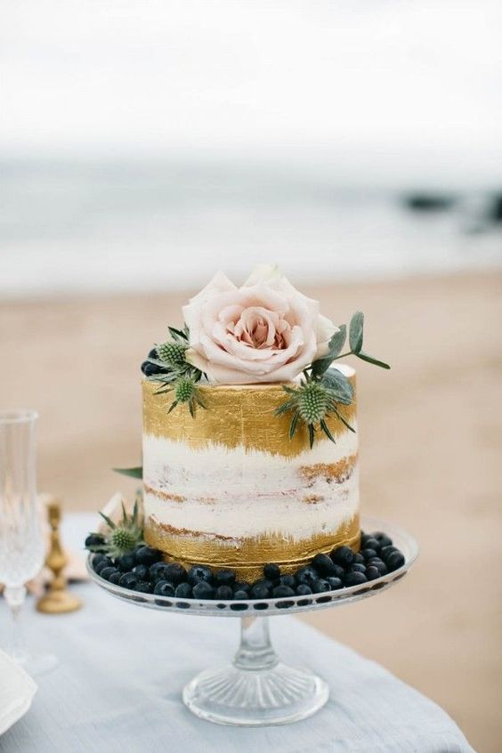 semi naked gold painted wedding cake idea for Irish spring wedding: 