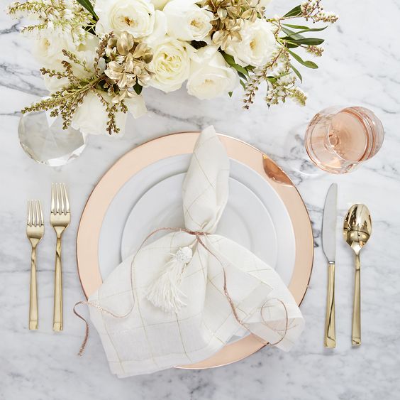Add a touch of glam to your home decor with copper and gold hues that will warm up any table setting.: 