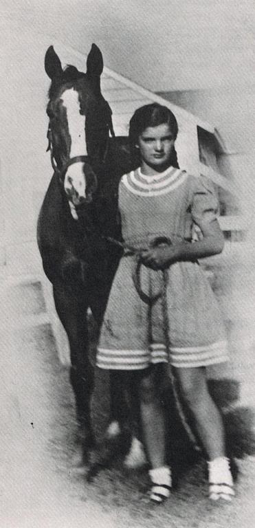Jaqueline Bouvier and her horse.