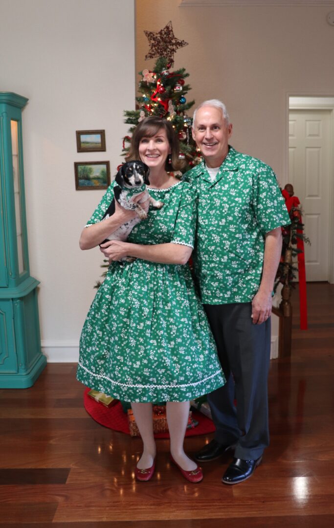 Mr. and Mrs. Decor with Gracie the doxie