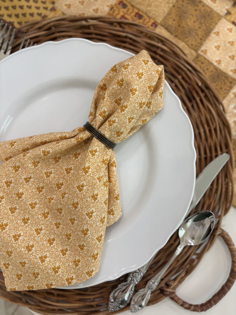 Calico napkin on white plate