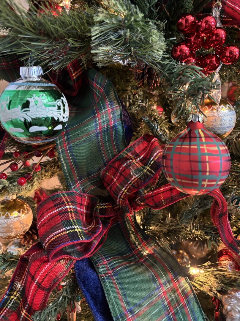 Vintage ornaments on tree.