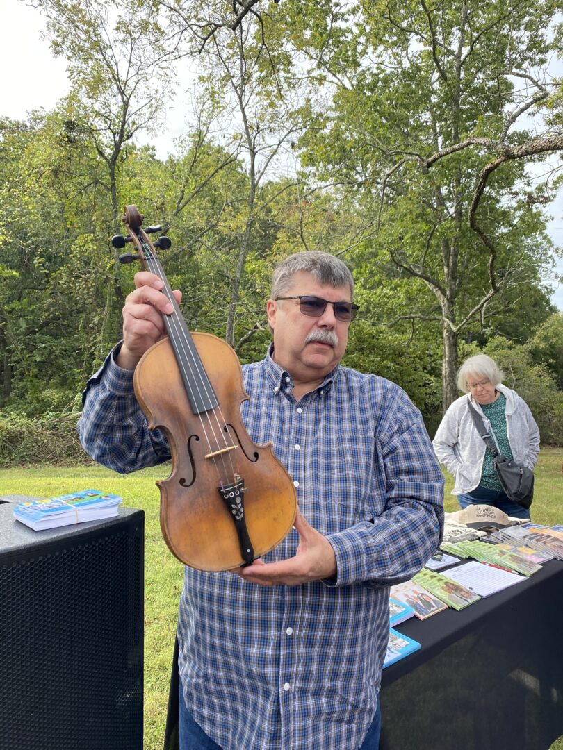 David Wilson playing Charles Ingalls fiddle David Wilson playing Charles Ingalls fiddle