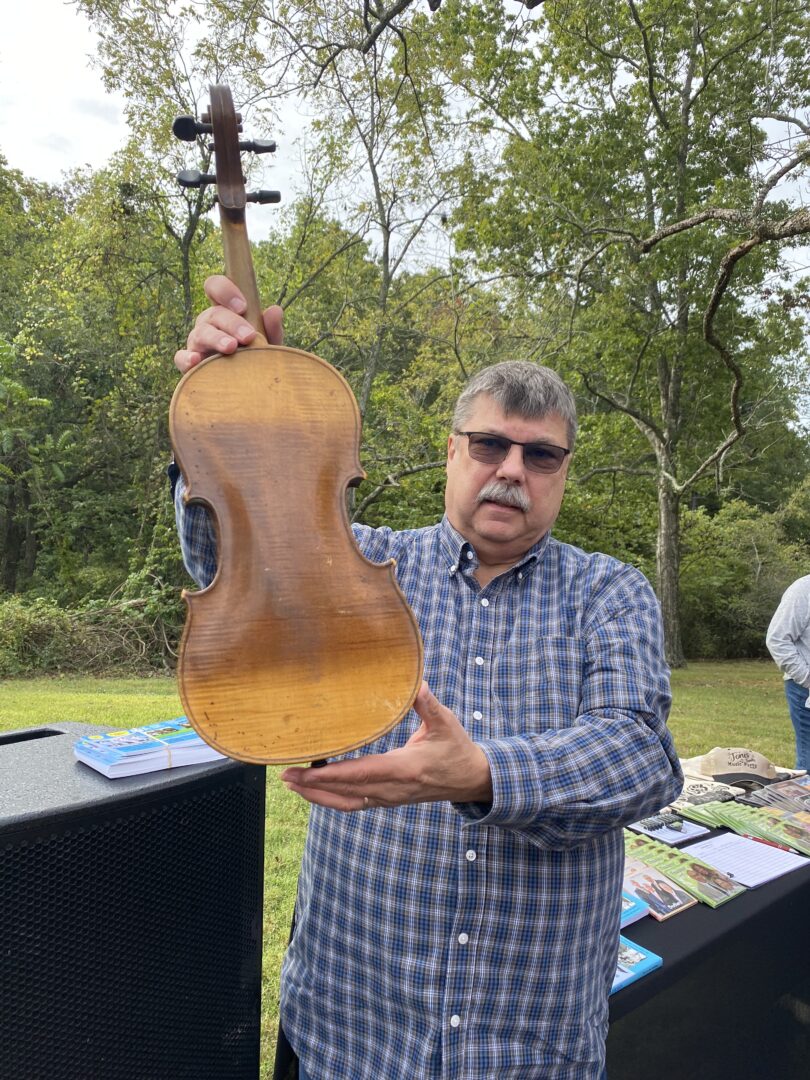 David Wilson playing Charles Ingalls fiddle David Wilson playing Charles Ingalls fiddle